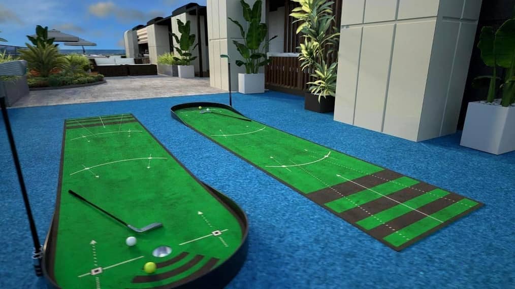 3D-визуализация зоны отдыха с площадками для мини-гольфа, расположенной на открытой террасе жилого комплекса.